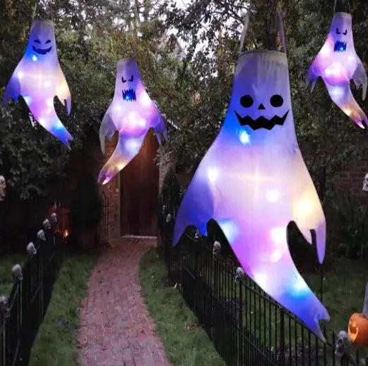 Halloween Decoration Ghost Face Glow with glowing ghostly face, ideal for spooky decor indoors or outdoors.