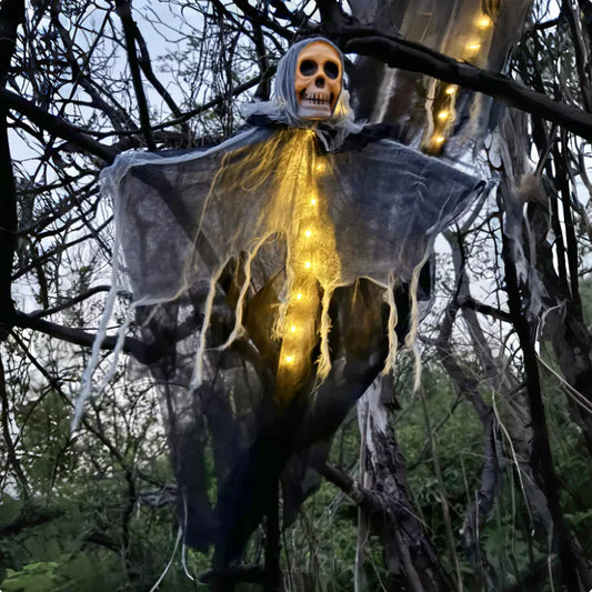 Mesmerizing Glo-Specter Skulls emitting LED glow amidst outdoor Halloween decor.